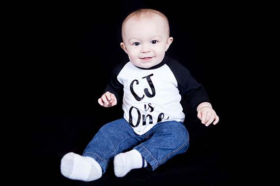 Little boy's 1 year old baby portrait in the Photos By Orion studio in Salem, Oregon