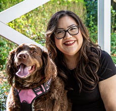 Woman and her dog posing for a photo at Deepwood Estate and Gardens in Salem, Oregon